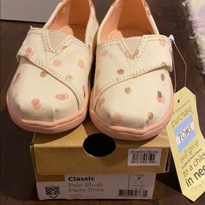 Brand new toddler TOMS classic size 7